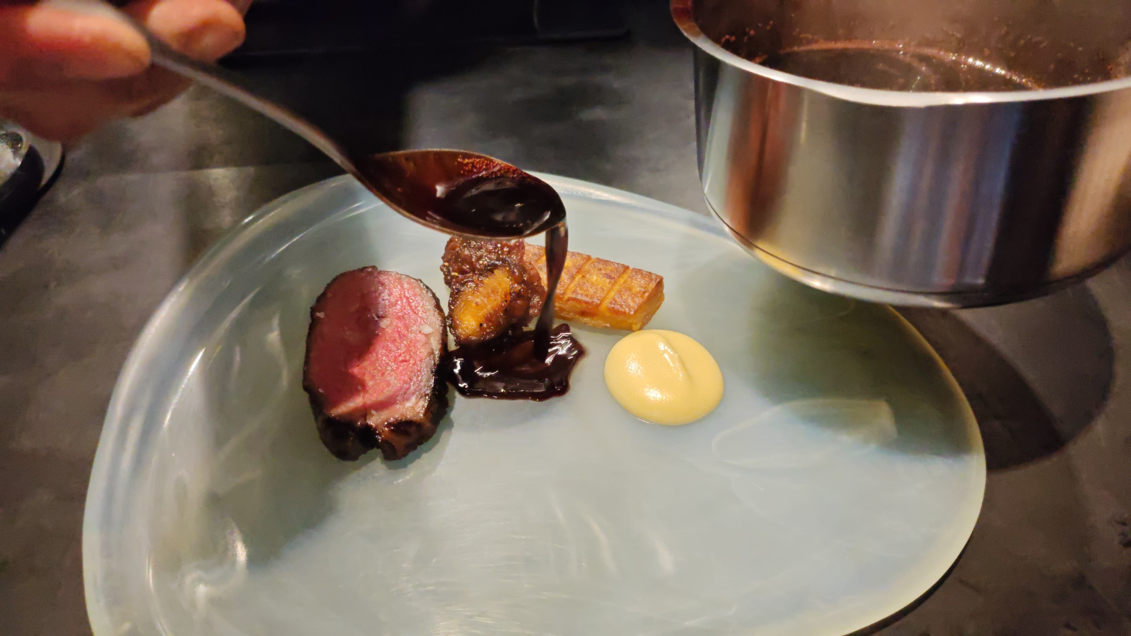 Course 6 — Red wine jus poured tableside